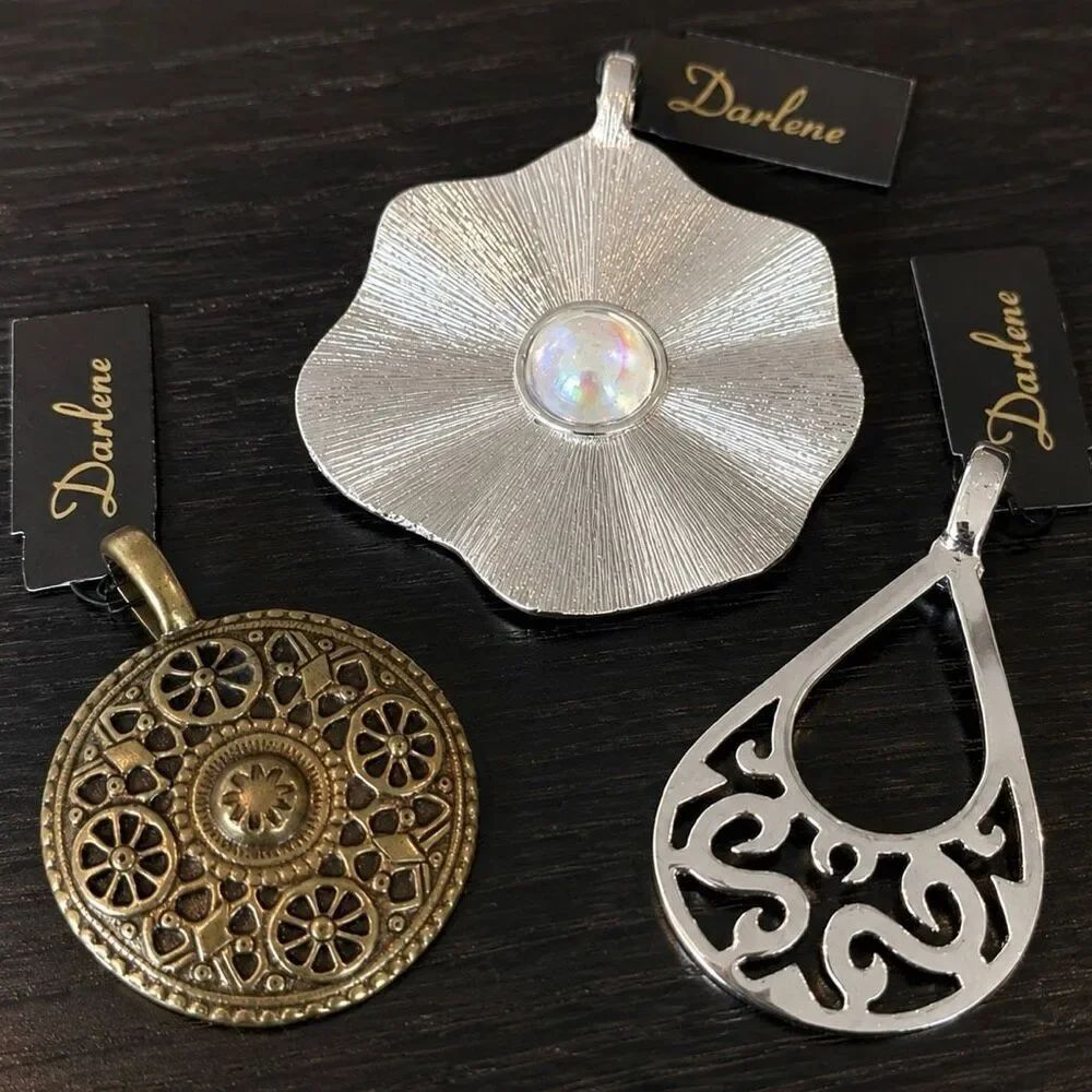 Pendant Trio – Mixed Metal Set with Crystal, Scroll, & Medallion Designs